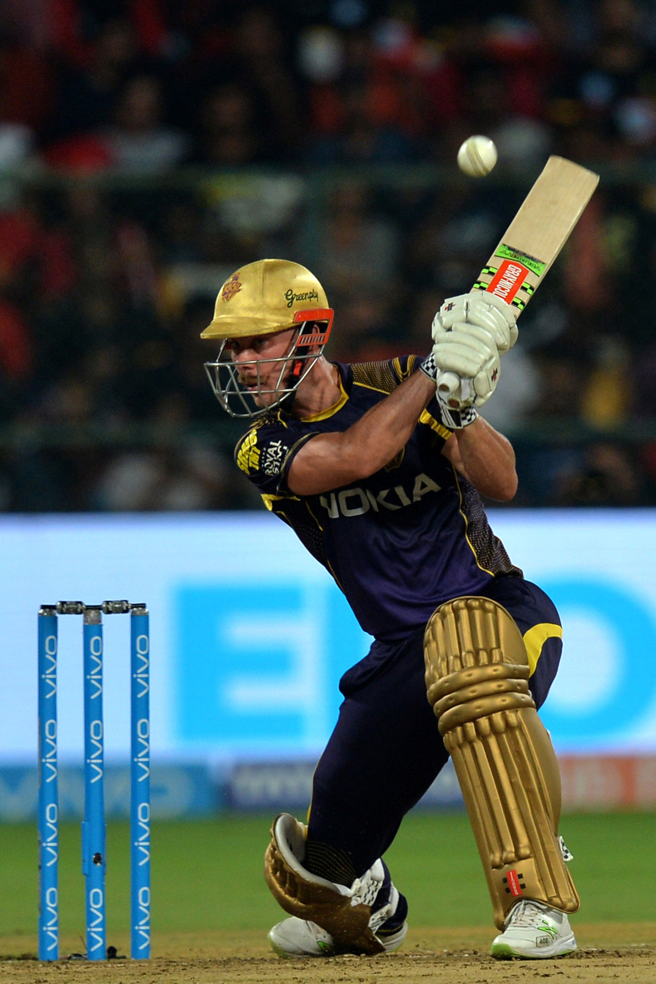 Chris Lynn bends his back knee and drives emphatically, Royal Challengers Bangalore v Kolkata Knight Riders, IPL 2018, Bengaluru, April 29, 2018
