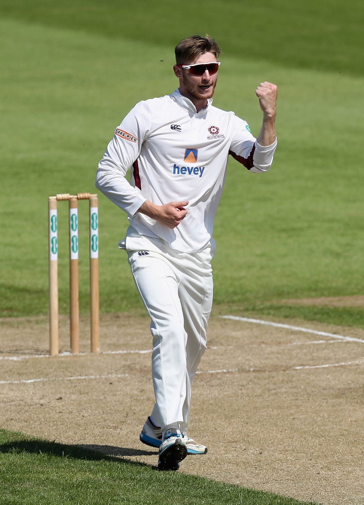 Rob Keogh punches in the air to celebrate the dismissal of Imam-ul-Haq, Northamptonshire v Pakistan, Day 2, Northampton, May 5, 2018