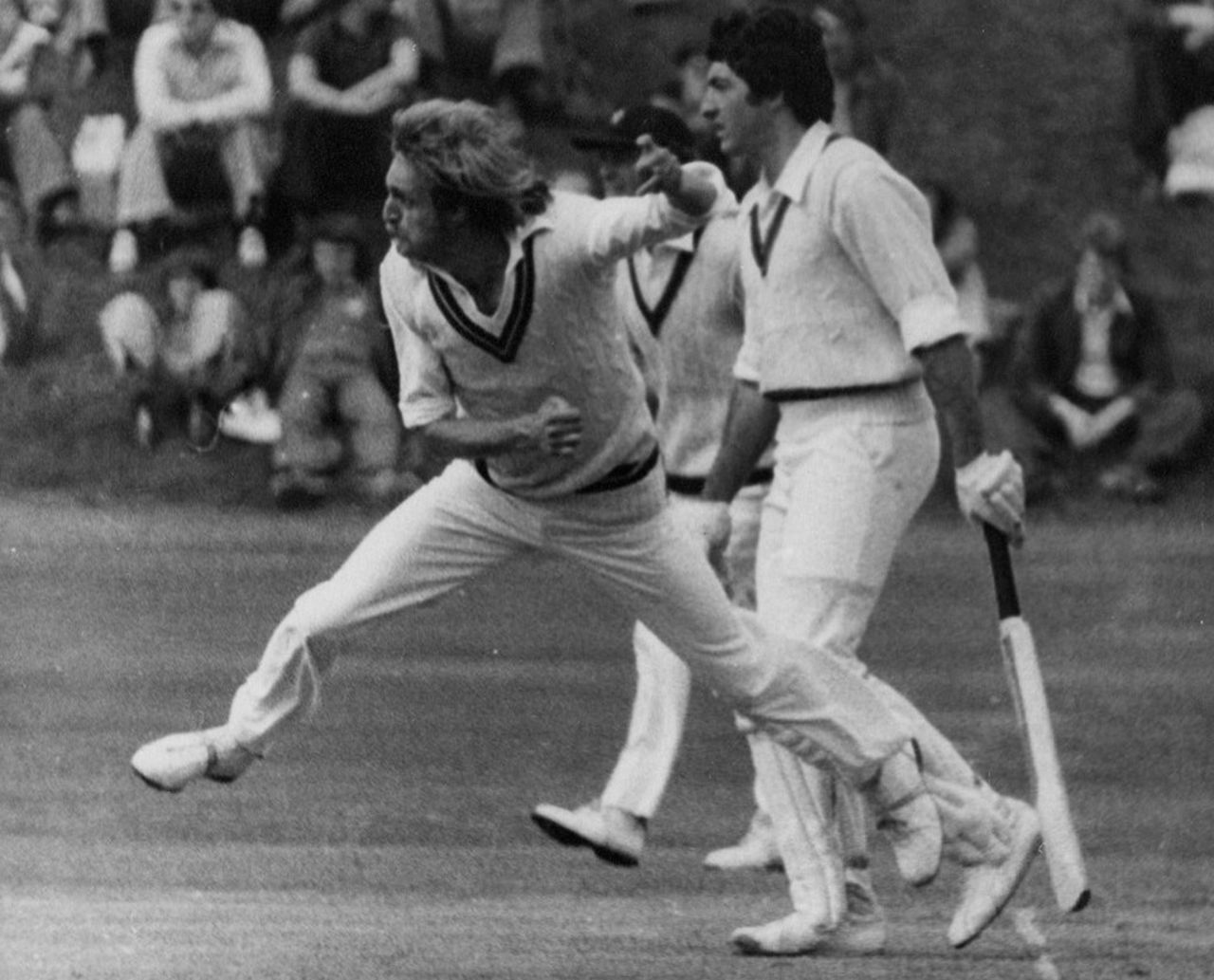 Stuart Wilkinson bowls, with non-striker Craig Serjeant looking on, Minor Counties v Australians, Sunderland, August 4, 1977
