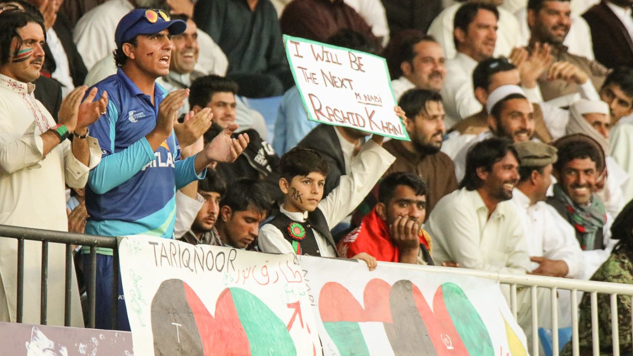 A young fan in Sharjah makes sure everyone knows that Rashid Khan is his idol, Afghanistan v Ireland, 3rd ODI, Sharjah, December 10, 2017