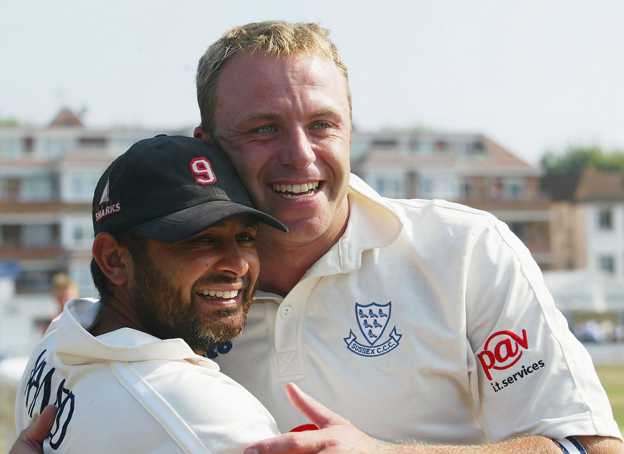 Mushtaq Ahmed and Chris Adams celebrate Sussex's championship win, Sussex v Leicestershire, County Championship Division One, Hove, day two, September 18, 2003