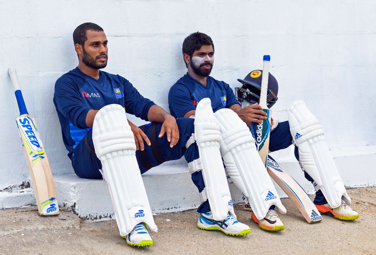 Roshen Silva and Niroshan Dickwella prepare for a hit in the nets, West Indies v Sri Lanka, 1st Test, Port of Spain, June 5, 2018