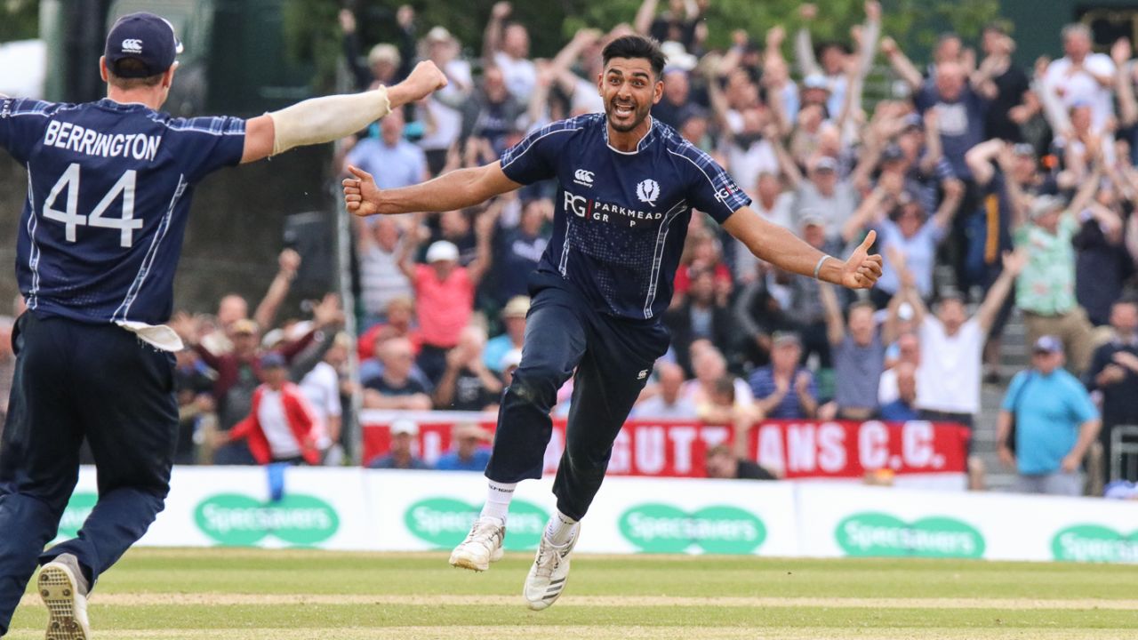 Safyaan Sharif sprints off after the final wicket to seal a historic maiden win over England, Scotland v England, only ODI, Edinburgh, June 10, 2018