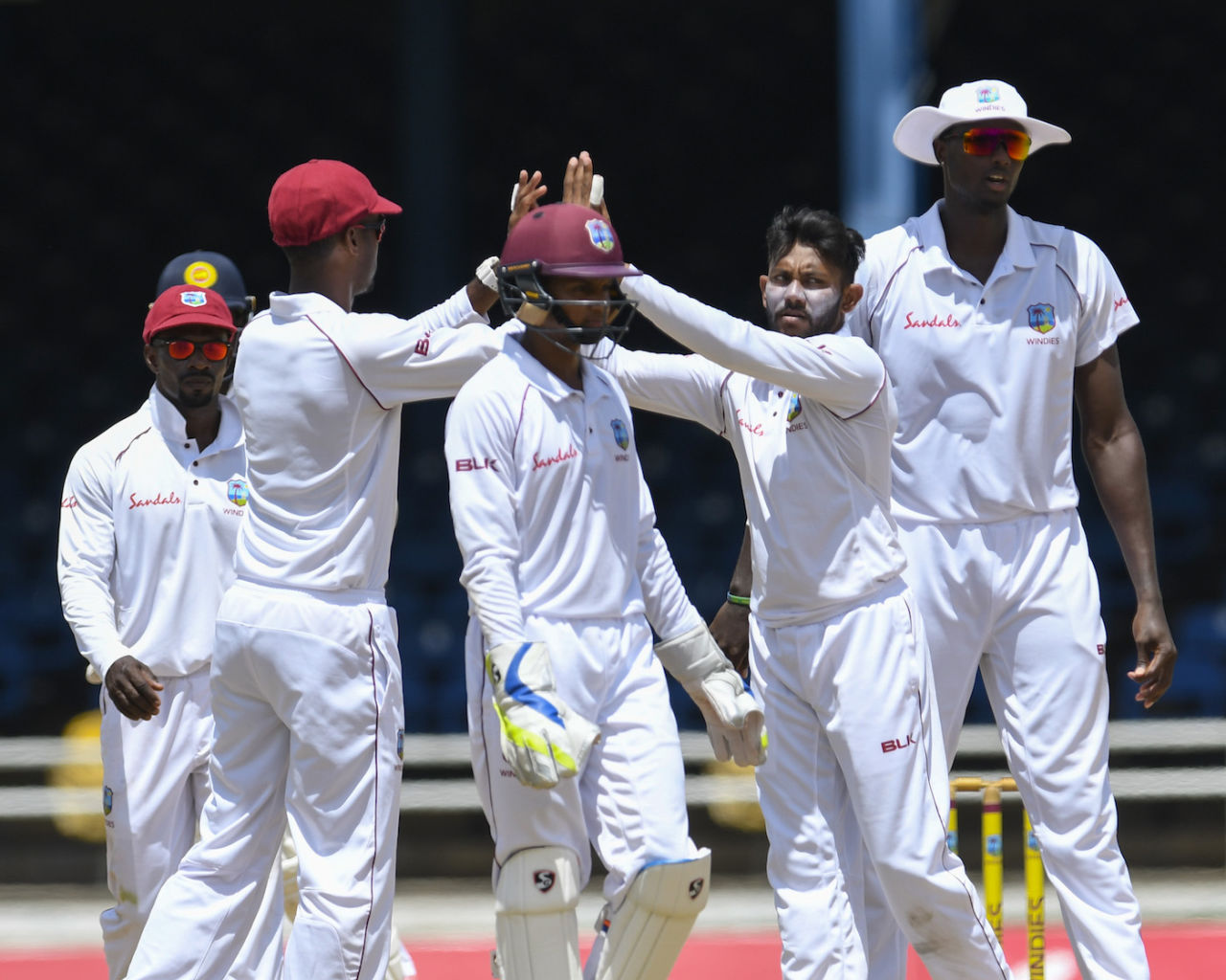 Devendra Bishoo is congratulated after taking a wicket, West Indies v Sri Lanka, 1st Test, Port of Spain, 5th day, June 10, 2018