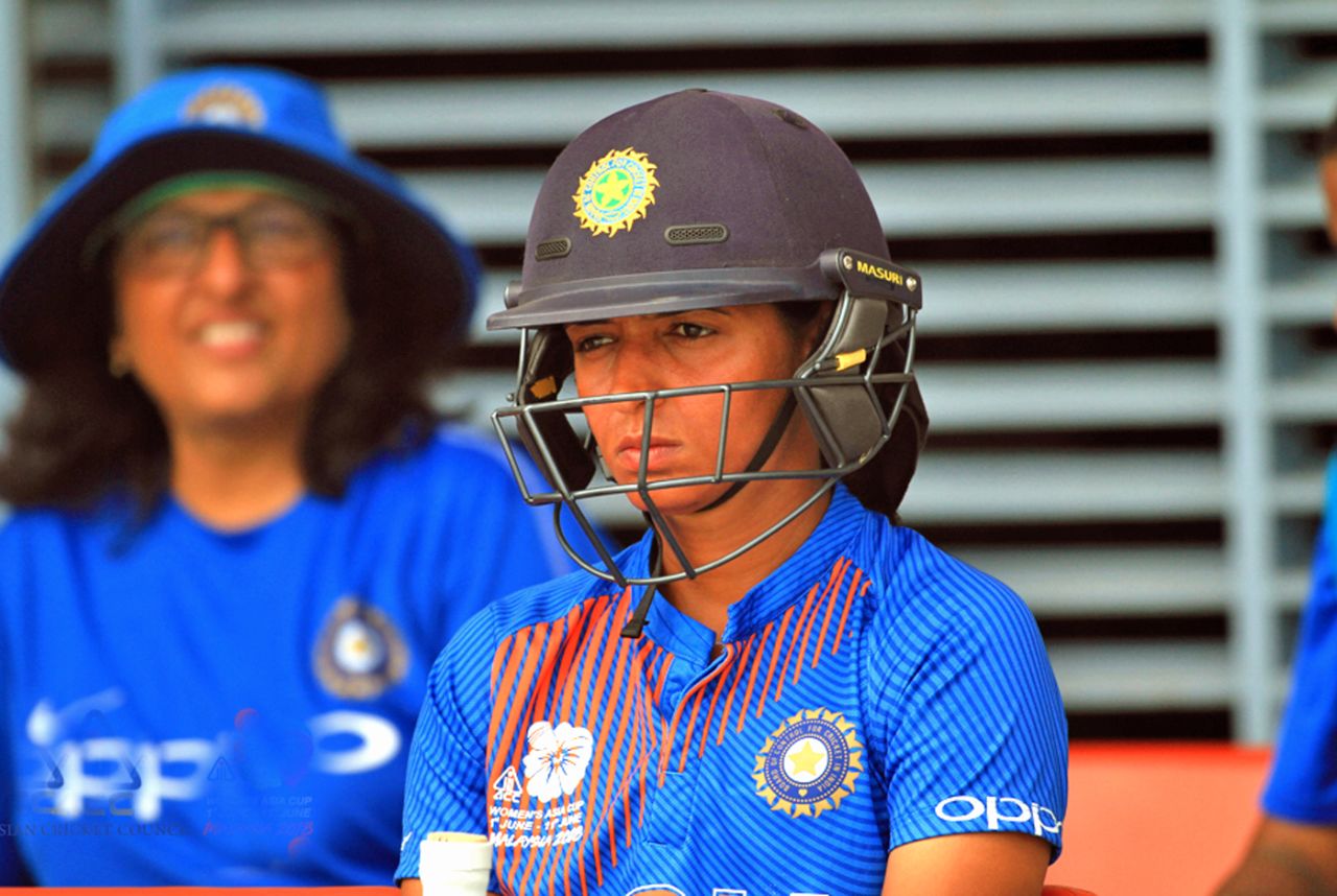 A pensive Harmanpreet Kaur awaits her turn in the dugout, India v Bangladesh, women's Asia Cup final. Kuala Lumpur, June 10, 2018