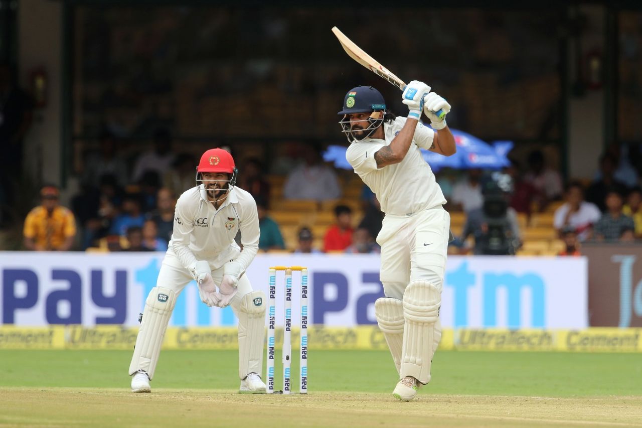 M Vijay hits through the covers. India v Afghanistan, Only Test, Bengaluru, 1st day.