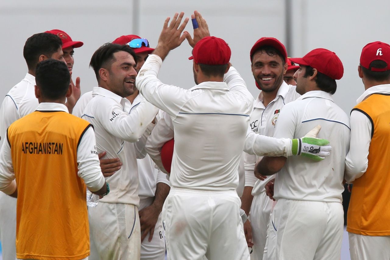 Rashid Khan celebrates Ajinkya Rahane's wicket, India v Afghanistan, Only Test, Bengaluru, 1st day, June 14, 2018