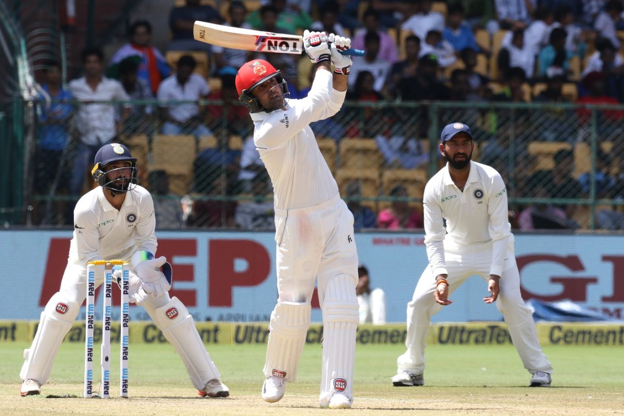Mohammad Nabi plays an attacking shot. India v Afghanistan, Only Test, Bengaluru, 2nd day, June 15, 2018