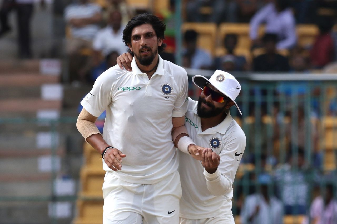 Ishant Sharma and Ravindra Jadeja celebrate a wicket, India v Afghanistan, Only Test, Bengaluru, 2nd day, June 15, 2018