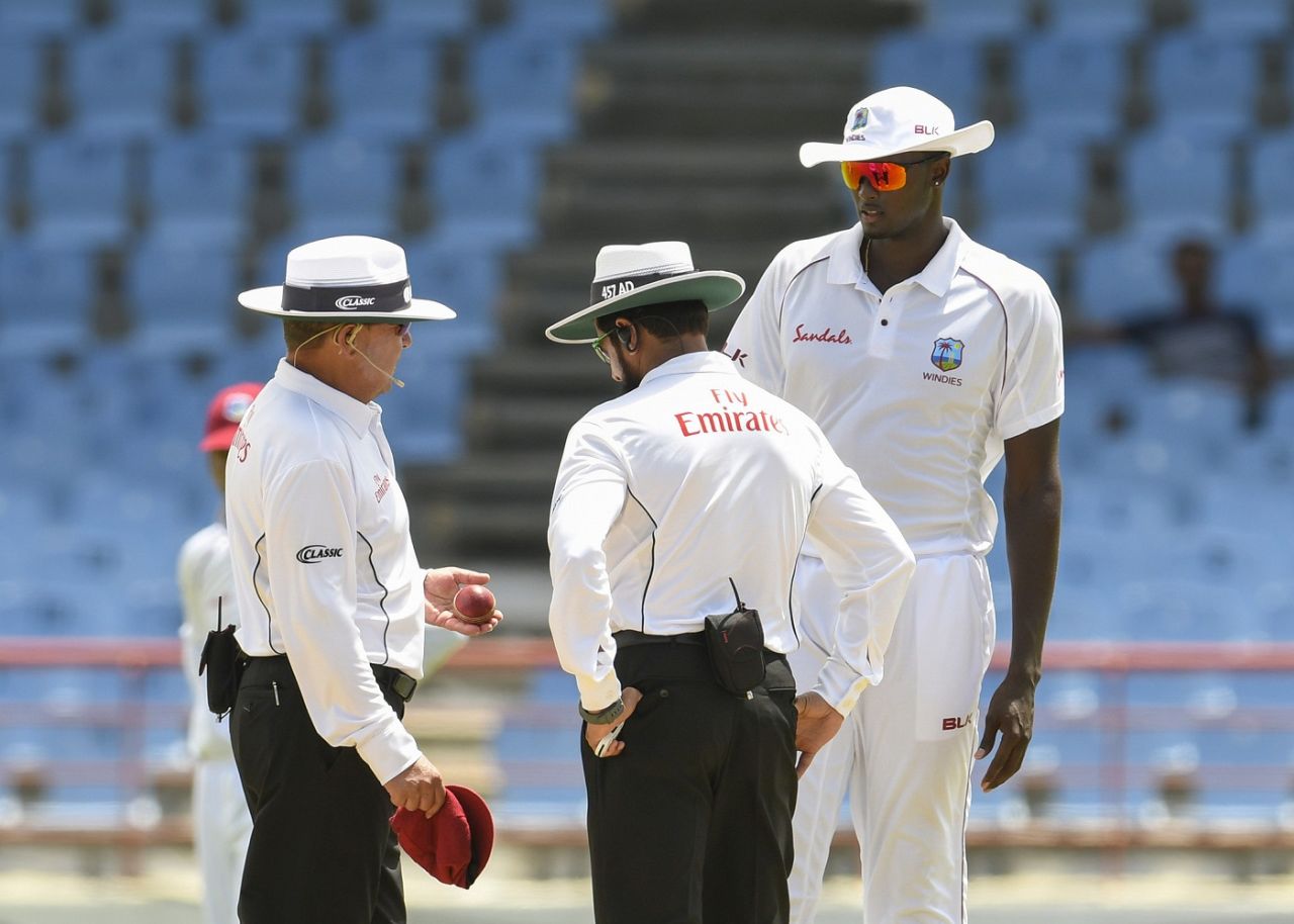 Umpires Ian Gould, Aleem Dar and Jason Holder examine the ball, West Indies v Sri Lanka, 2nd Test, St Lucia, 4th day, June 17, 2018