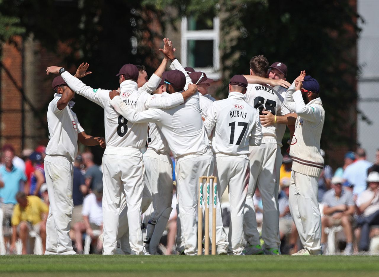 Job done: Surrey celebrate their innings victory, Surrey v Somerset, Specsavers Championship, Division One, Guildford, June 22, 2018