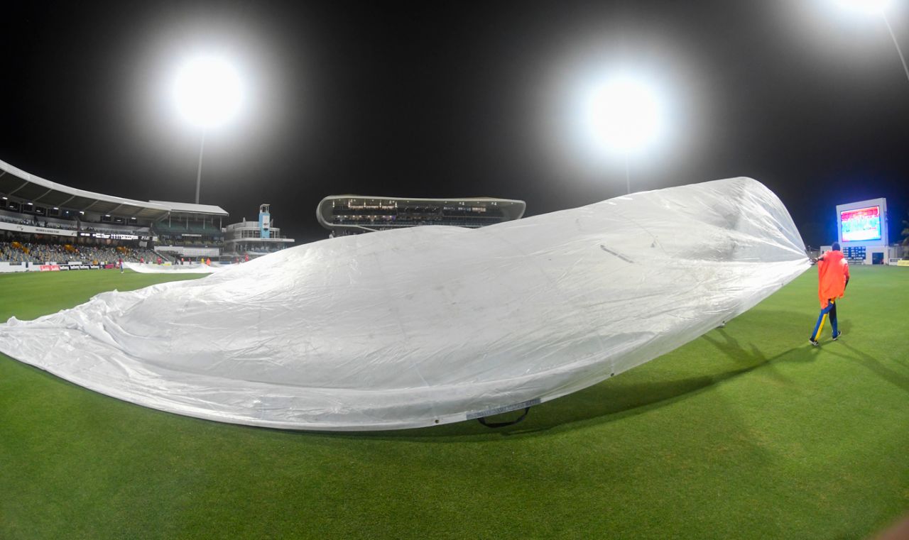 Covers come onto the field at the Kensington Oval, West Indies v Sri Lanka, 3rd Test, Bridgetown, 1st day, June 23, 2018