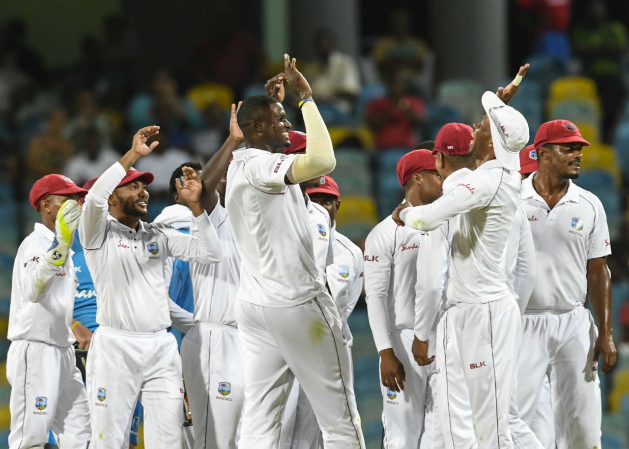 Jason Holder celebrates with his team-mates, West Indies v Sri Lanka, 3rd Test, Barbados, 2nd day, June 24, 2018
