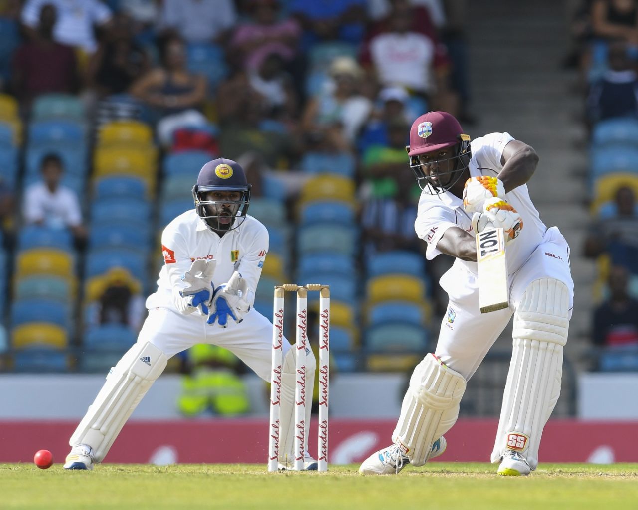 Jason Holder drives through the covers. West Indies v Sri Lanka, 3rd Test, Bridgetown, 2nd day, June 24, 2018