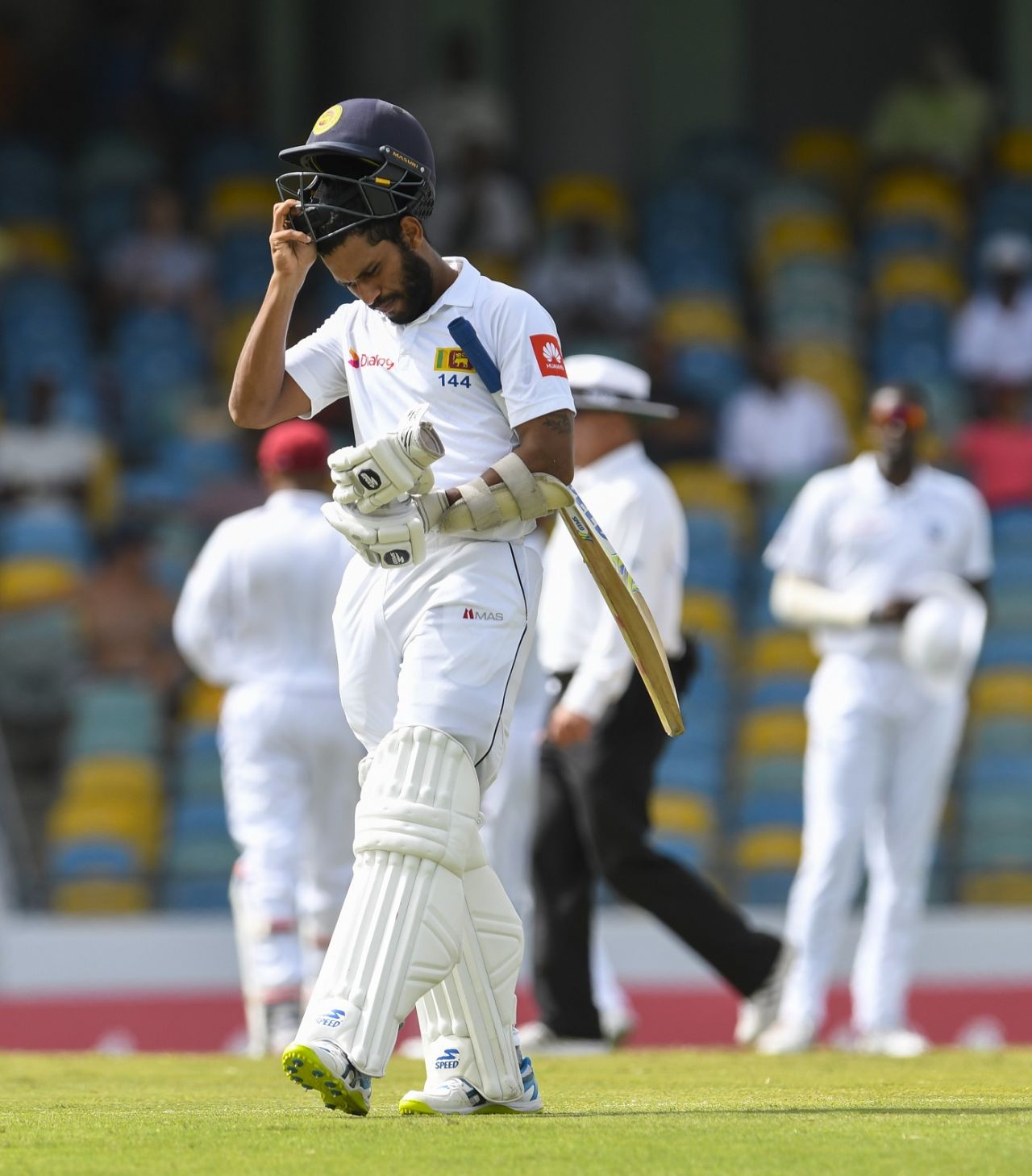 Roshen Silva walks back. West Indies v Sri Lanka, 3rd Test, Bridgetown, 3rd day, June 25, 2018