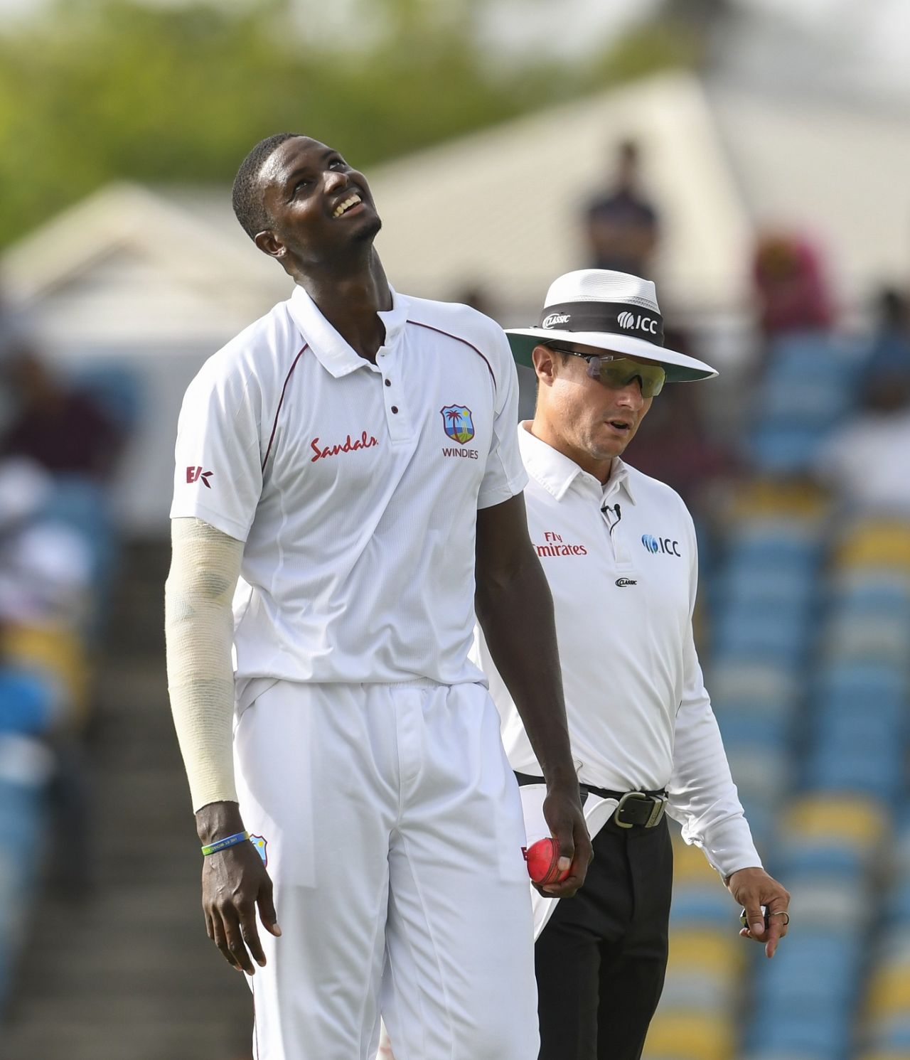 Jason Holder has a lighter moment on the field. West Indies v Sri Lanka, 3rd Test, Bridgetown, 3rd day, June 25, 2018