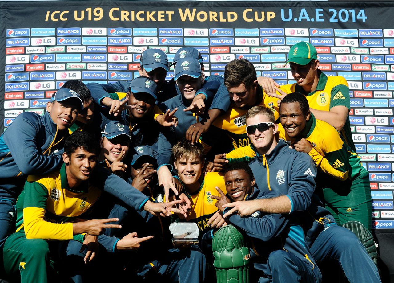 The South African Under-19 players congratulate their captain and Player of the Match Aiden Markram, Afghanistan v South Africa, Under-19 World Cup 2014, quarter-final, Sharjah, February 23, 2014