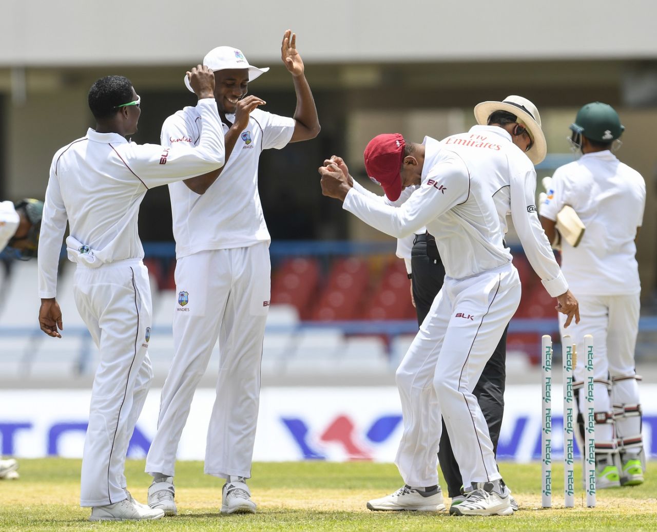 The West Indies team celebrates victory in the first Test, West Indies v Bangladesh, 1st Test, North Sound, 2nd day, July 6, 2018