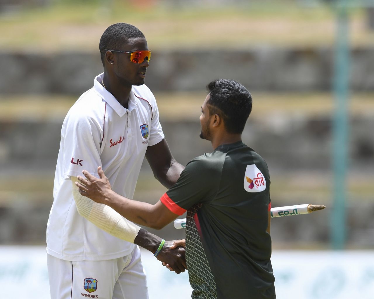 Jason Holder and Shakib Al Hasan shake hands after the first Test, West Indies v Bangladesh, 1st Test, North Sound, 2nd day, July 6, 2018