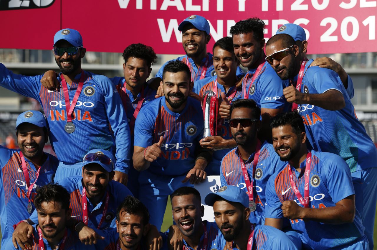 Virat Kohli poses with the trophy in the company of his team-mates, England v India, 3rd T20I, Final, Bristol, July 8, 2018