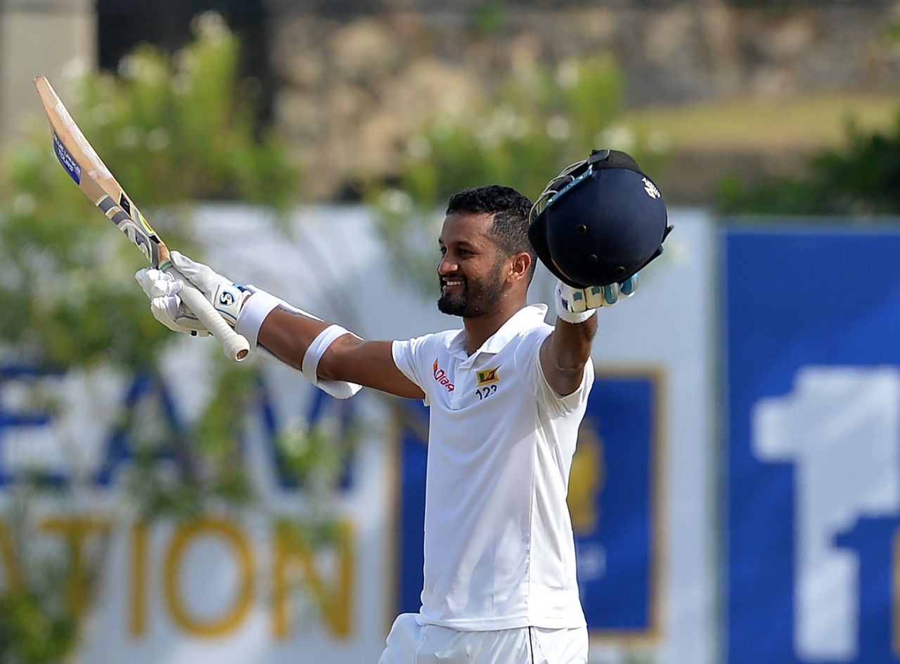 Dimuth Karunaratne raises his bat after reaching a century, Sri Lanka v South Africa, 1st Test, Galle, 1st day, July 12, 2018