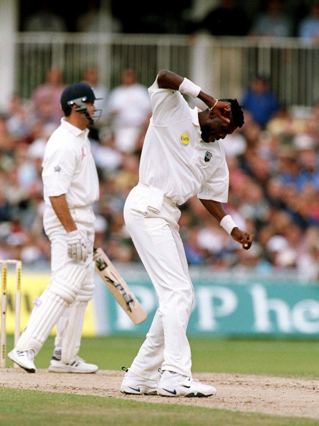 Curtly Ambrose celebrates the wicket of Graeme Hick, England v West Indies, fifth Test, day two, The Oval, September 1, 2000