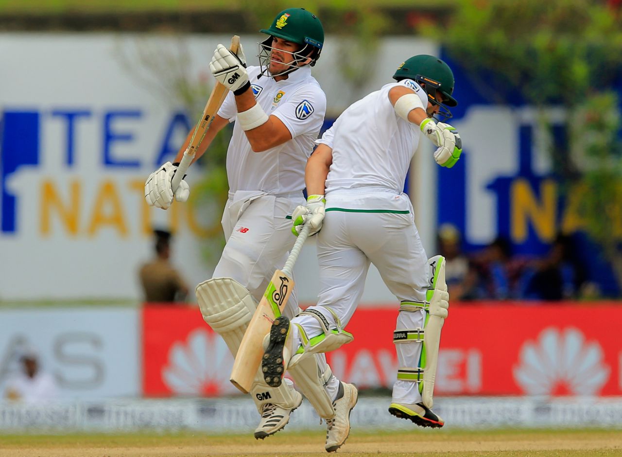 Aiden Markram and Dean Elgar try to avoid a collision while running between the wickets Sri Lanka v South Africa, 1st Test, Galle, 3rd day, July 14, 2018