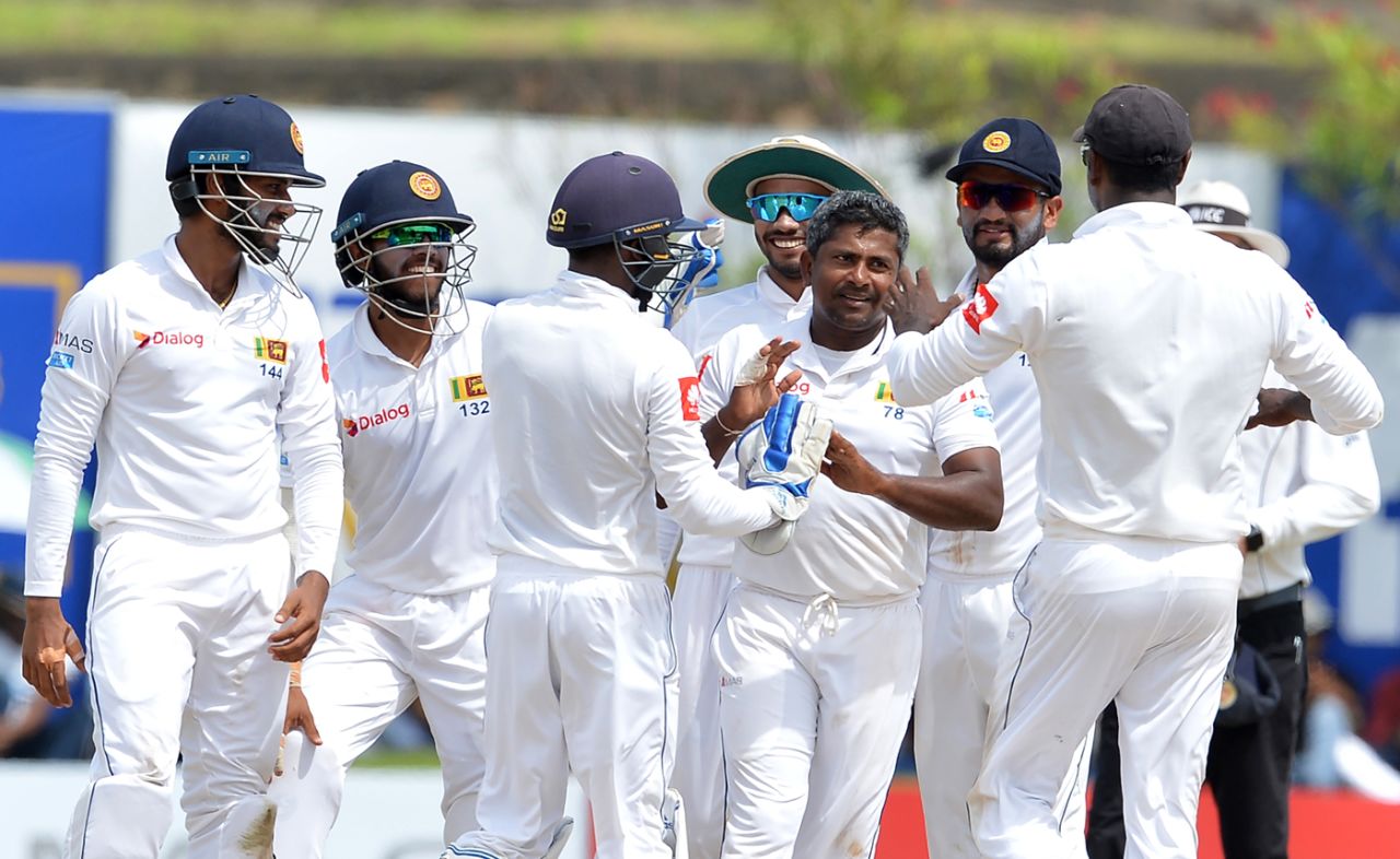 Rangana Herath is congratulated by his team-mates, Sri Lanka v South Africa, 1st Test, Galle, 3rd day, July 14, 2018