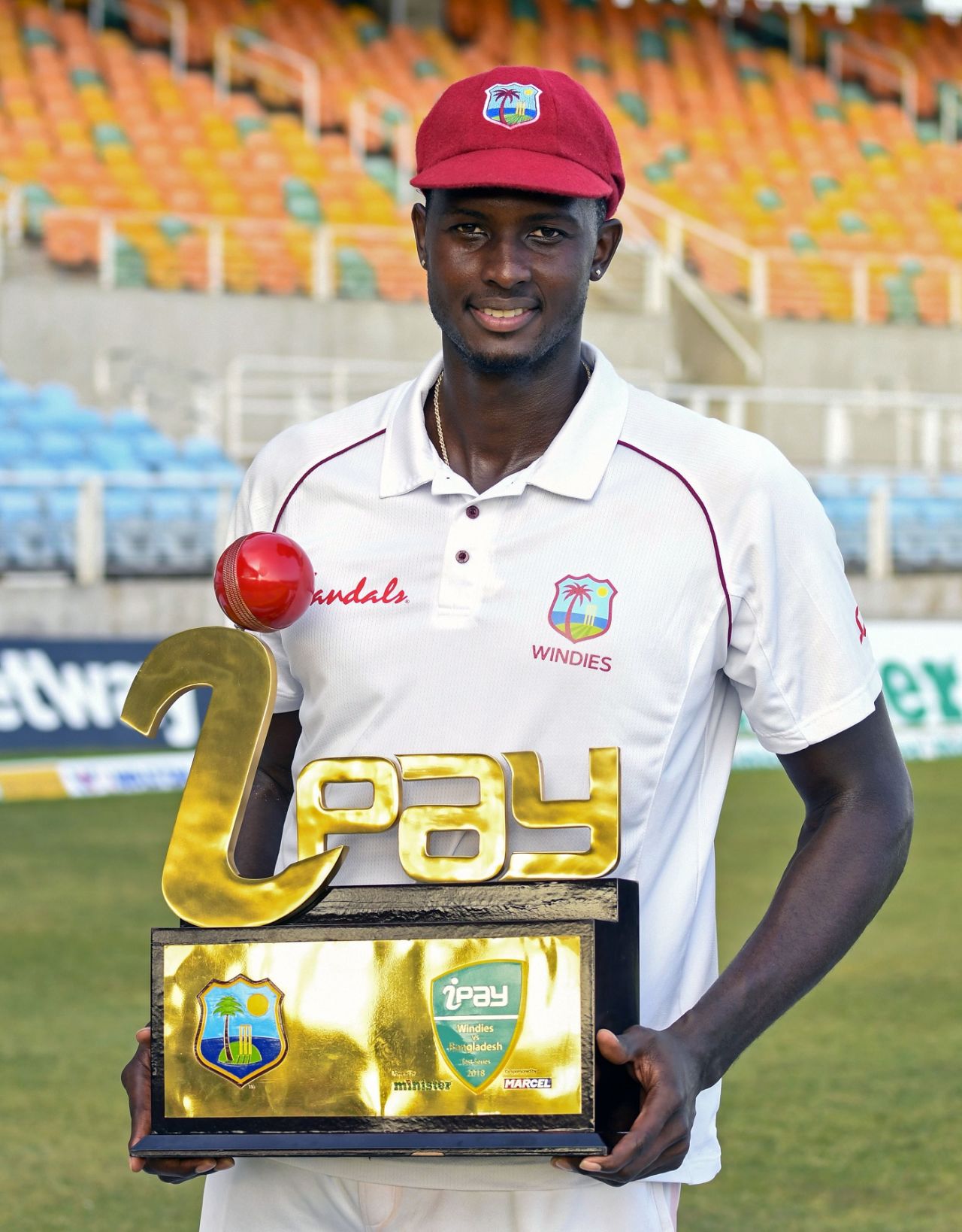 Jason Holder poses with the trophy after the series win, West Indies v Bangladesh, 2nd Test, Jamaica, 3rd day, July 14, 2018