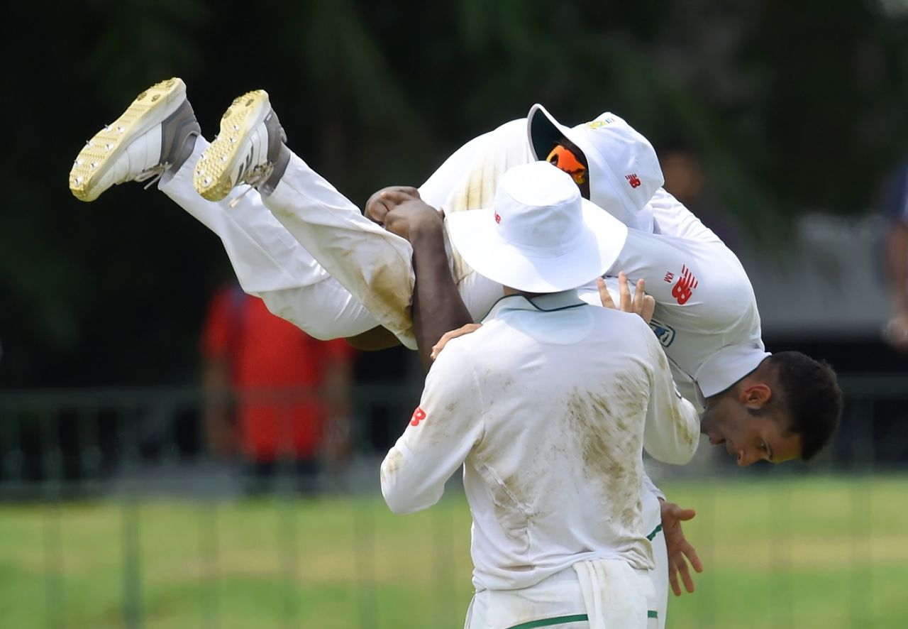 Kagiso Rabada lifts Keshav Maharaj in celebration, Sri Lanka v South Africa, 2nd Test, Colombo, 1st day, July 20, 2018