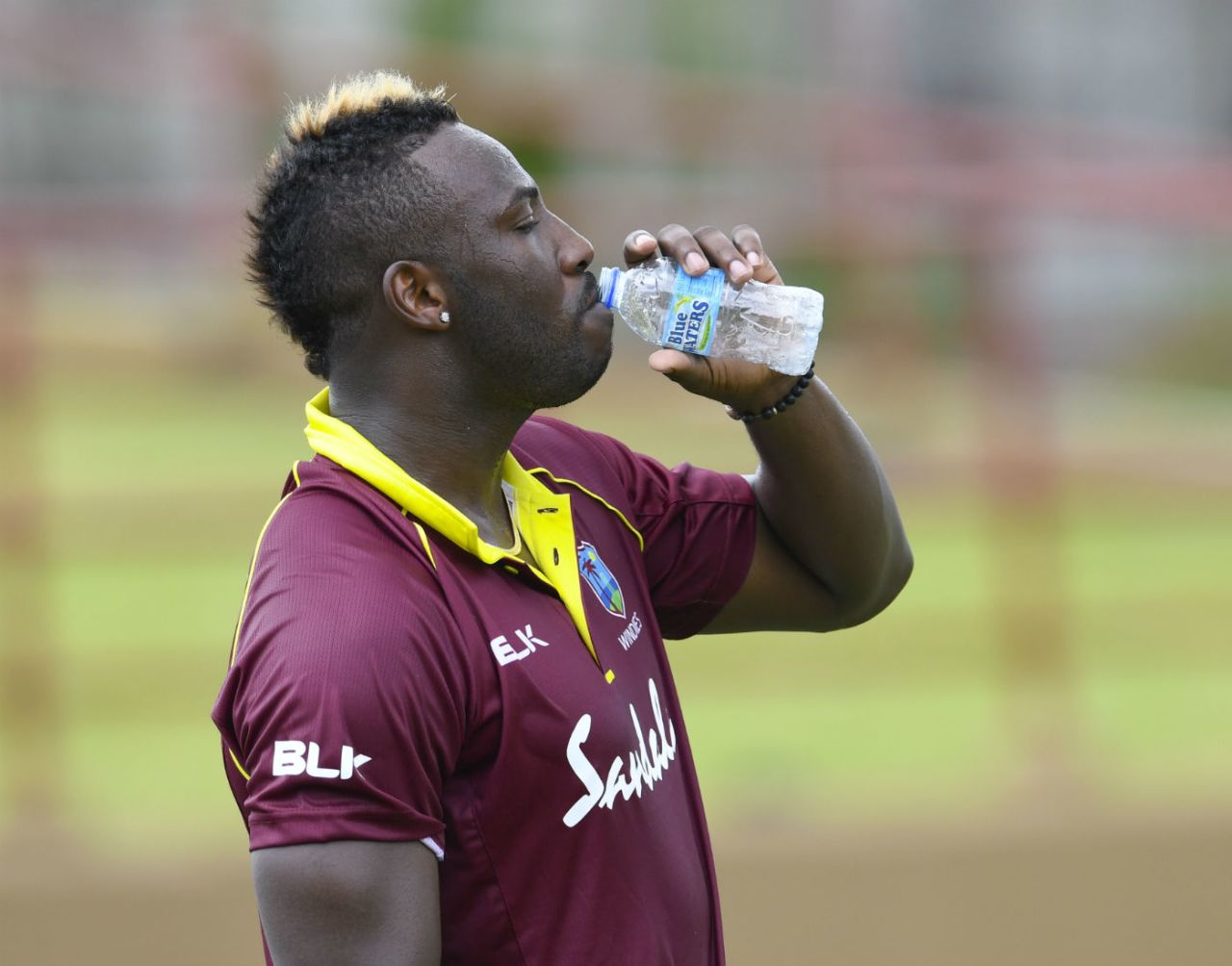 Andre Russell guzzles down water on a humid day, West Indies v Bangladesh, 1st ODI, Guyana, July 22, 2018
