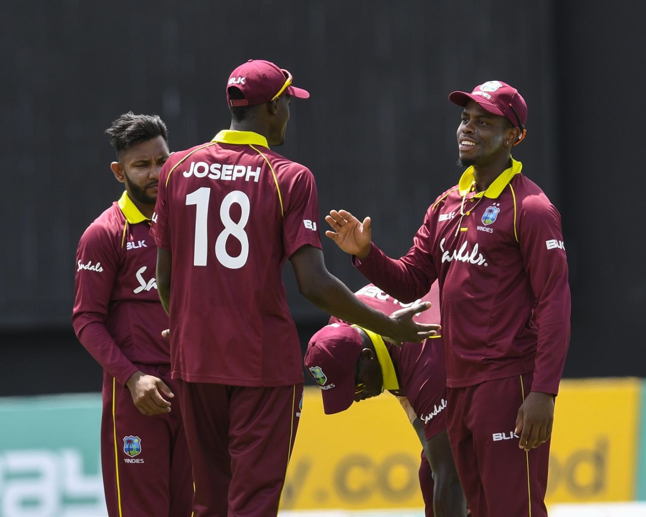 Devendra Bishoo, Alzarri Joseph and Shimron Hetmyer celebrate a wicket, West Indies v Bangladesh, 1st ODI, Guyana, July 22, 2018
