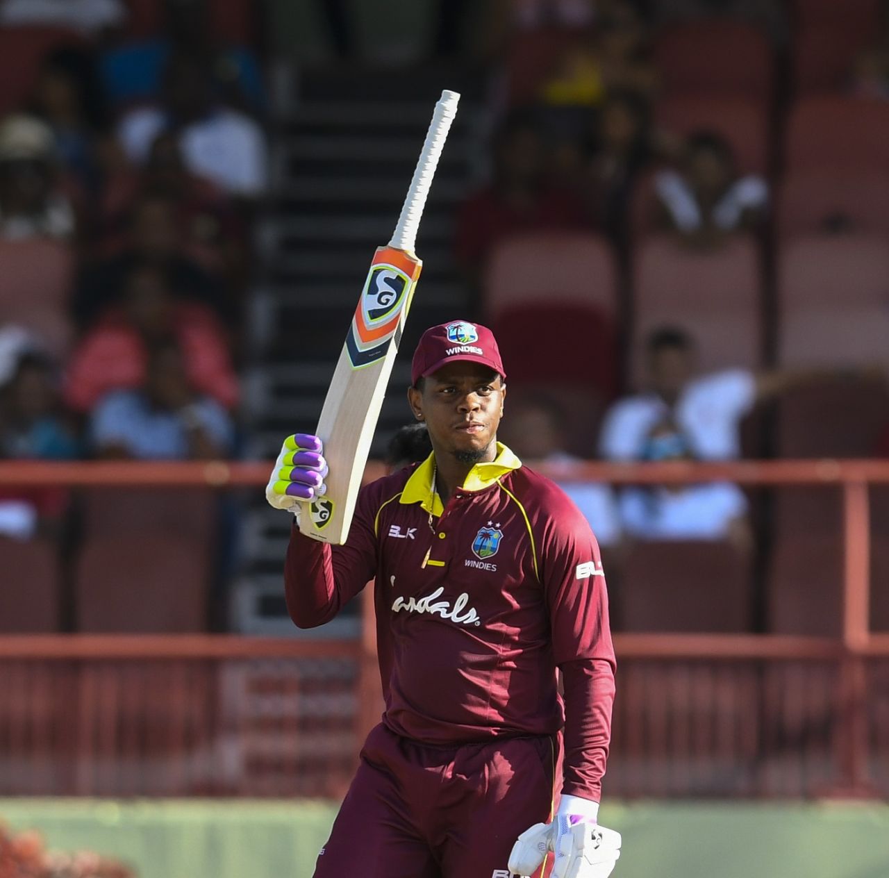 Shimron Hetmyer raises his bat to acknowledge a half-century, West Indies v Bangladesh, 1st ODI, Guyana, July 22, 2018