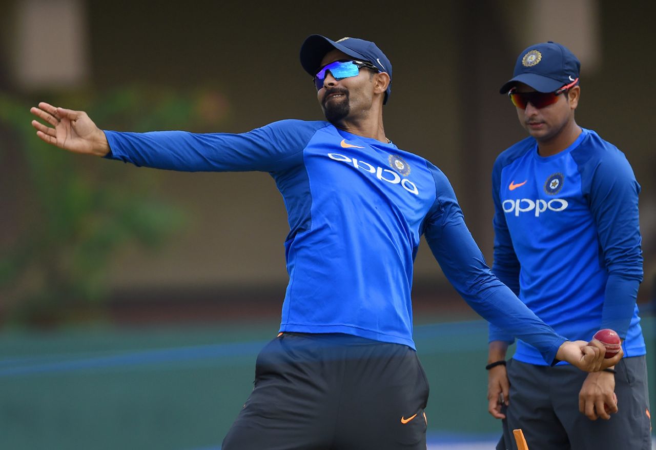 Kuldeep Yadav (right) looks on as Ravindra Jadeja bowls at practice ahead of the first Tests, Sri Lanka v India, Galle, July 24, 2017