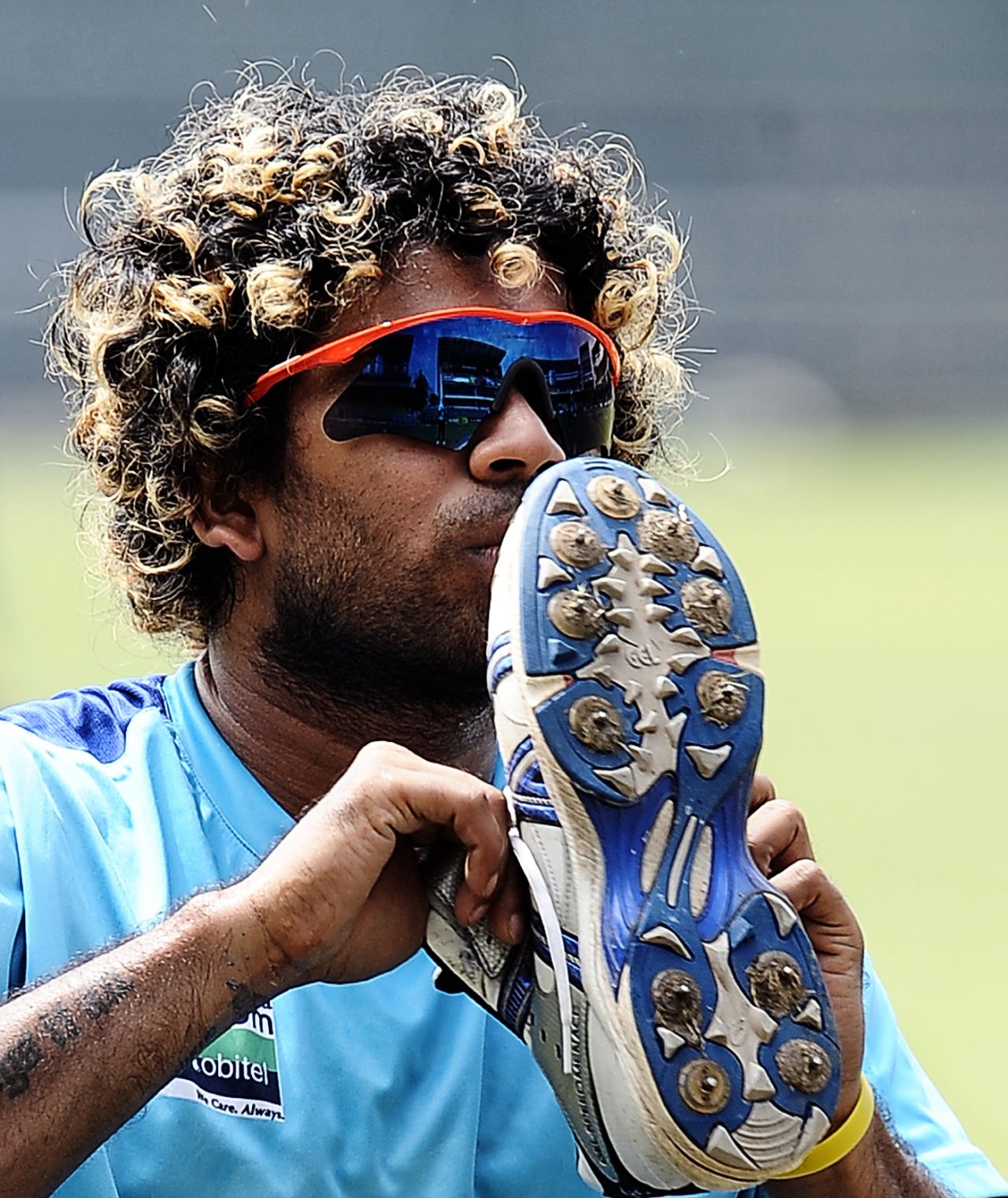 Lasith Malinga kisses his shoe, Colombo, June 15, 2012