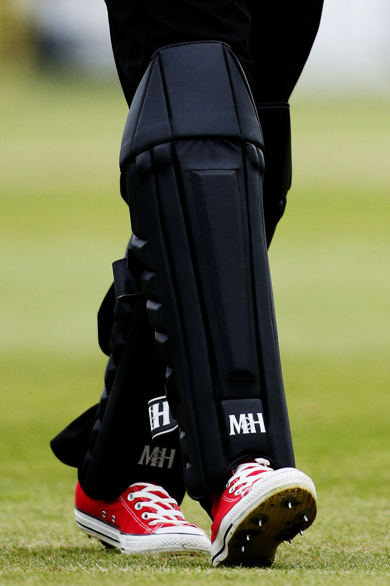 Craig Kieswetter wears a pair of Converse shoes with spikes, June 15, 2014