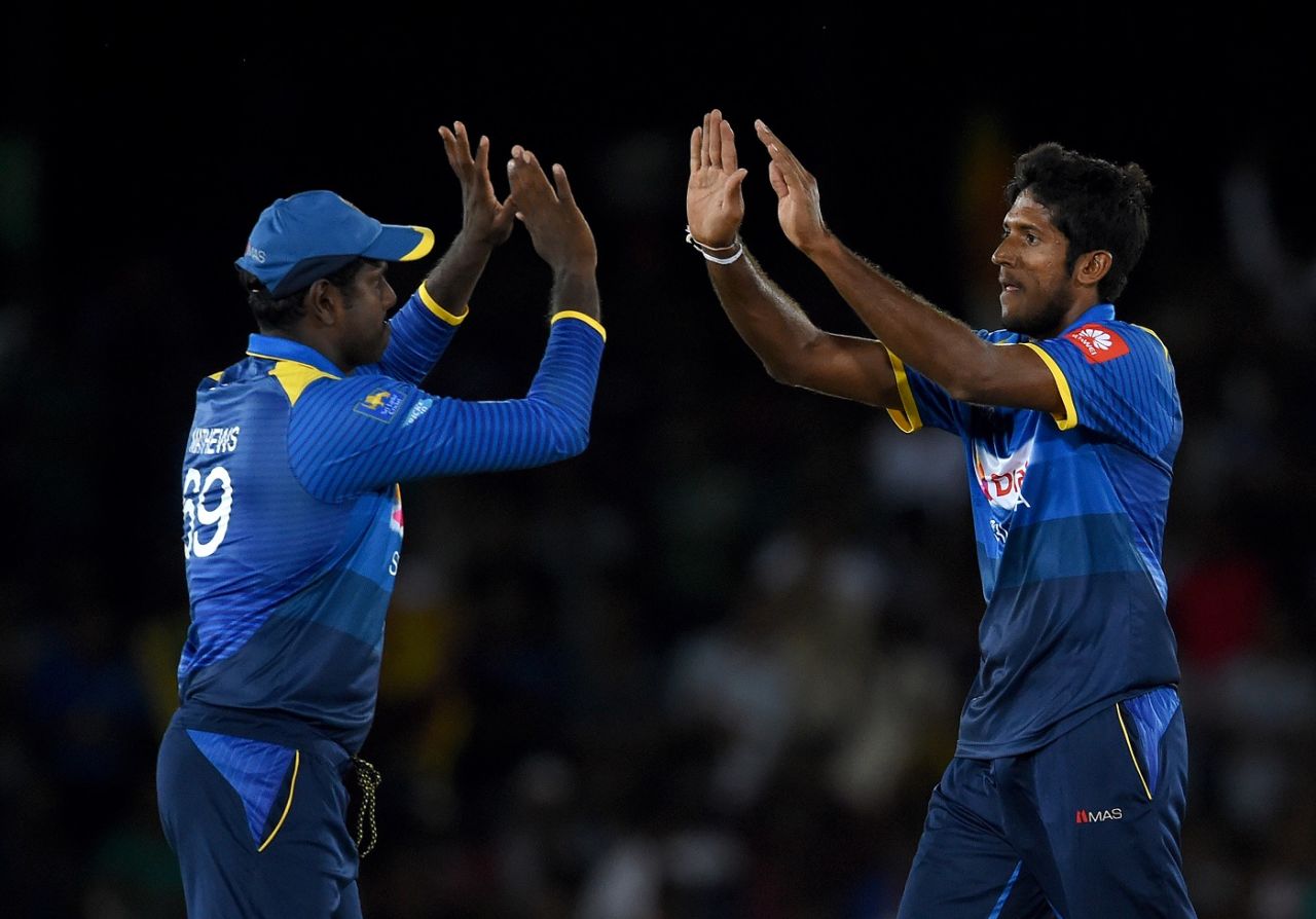 Kasun Rajitha celebrates Quinton de Kock's wicket with Angelo Mathews, Sri Lanka v South Africa, 2nd ODI, Dambulla, August 1, 2018