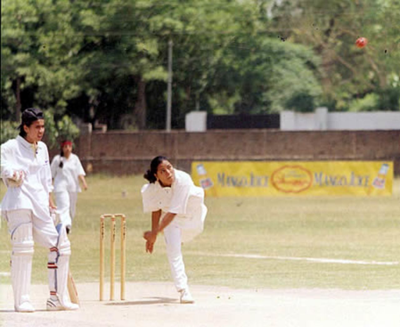 Raeesa Ilyas, left arm spinner in bowling action during a match, LCCA Ground, Lahore