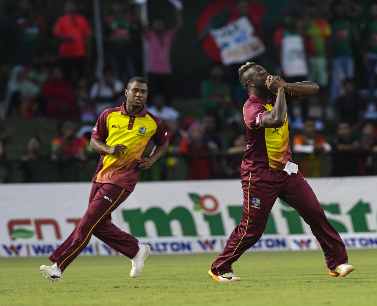 Andre Russell takes a catch with Evin Lewis looking on, West Indies v Bangladesh, 2nd T20I, Lauderhill, August 4, 2018