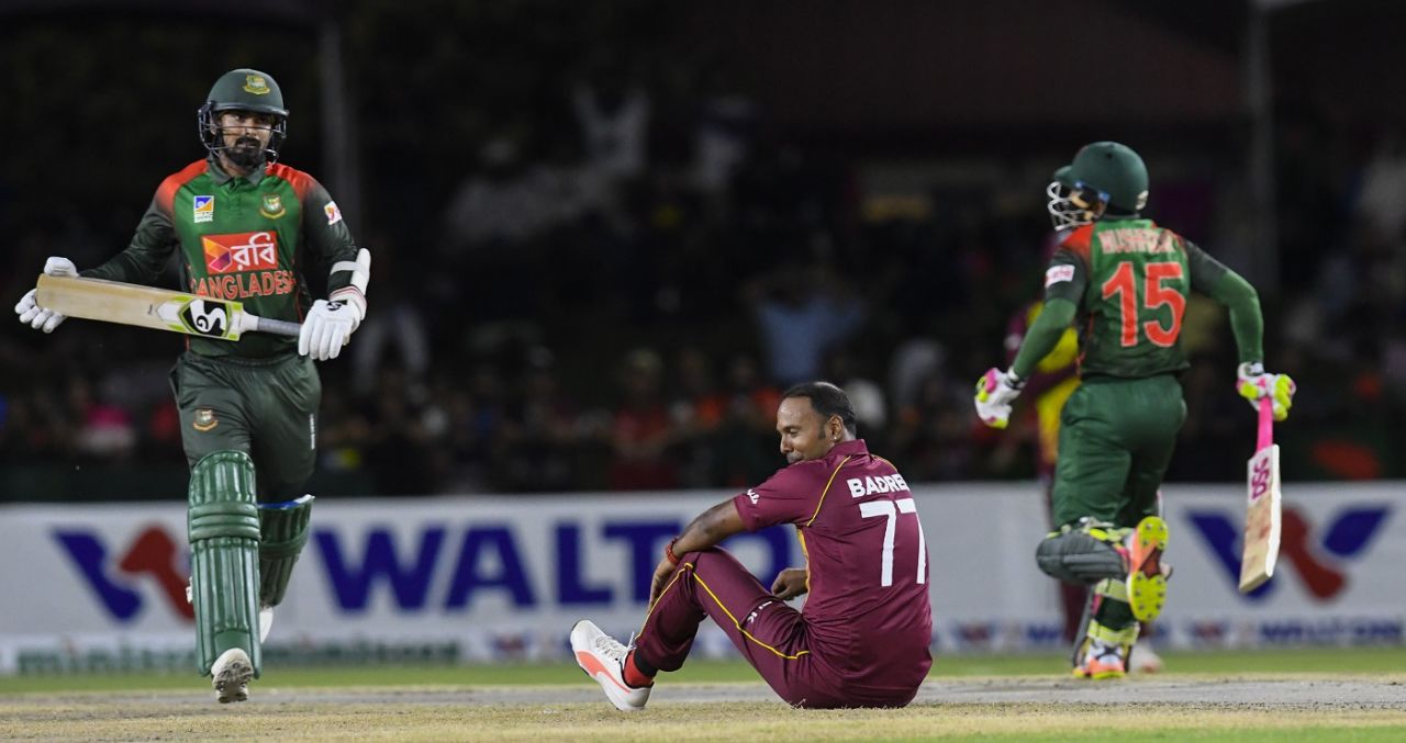 Samuel Badree is down on the ground as Liton Das and Mushfiqur Rahim take a run, West Indies v Bangladesh, 3rd T20I, Lauderhill, August 5, 2018