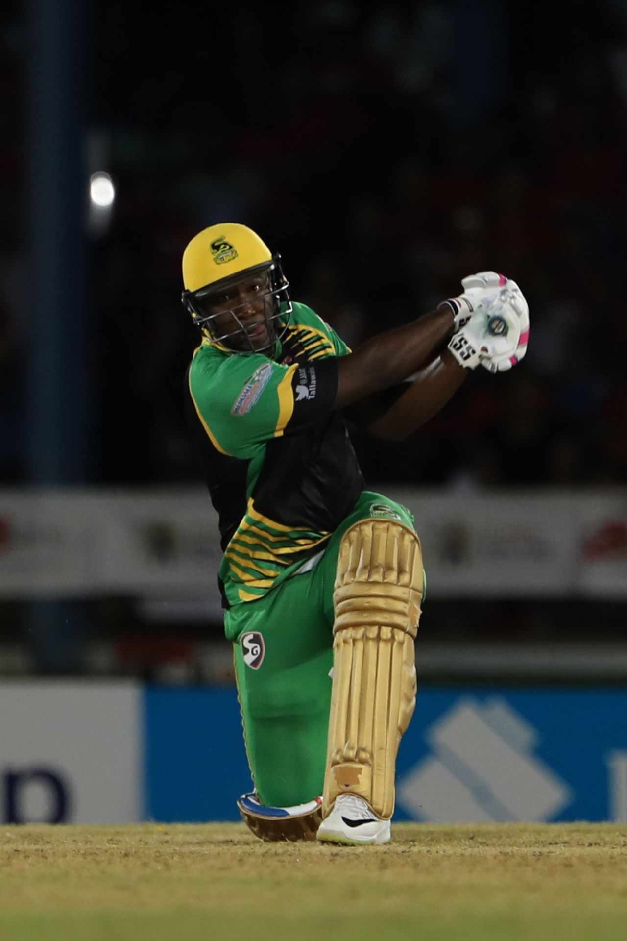 Andre Russell thumps one down the ground, Trinbago Knight Riders v Jamaica Tallawahs, CPL 2018, Port-of-Spain, August 11, 2018