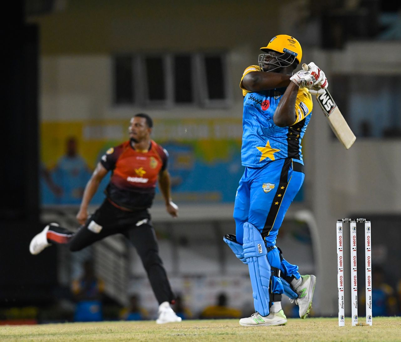 Rahkeem Cornwall clatters Shannon Gabriel over square leg, ST Lucia Stars v Trinbago Knight Riders, Gros Islet, August 16, 2018