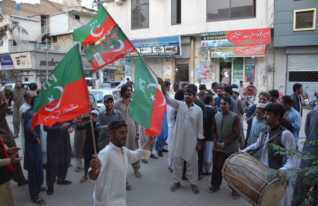 Supporters of Imran Khan celebrate his election as Pakistan Prime Minister, August 17, 2018