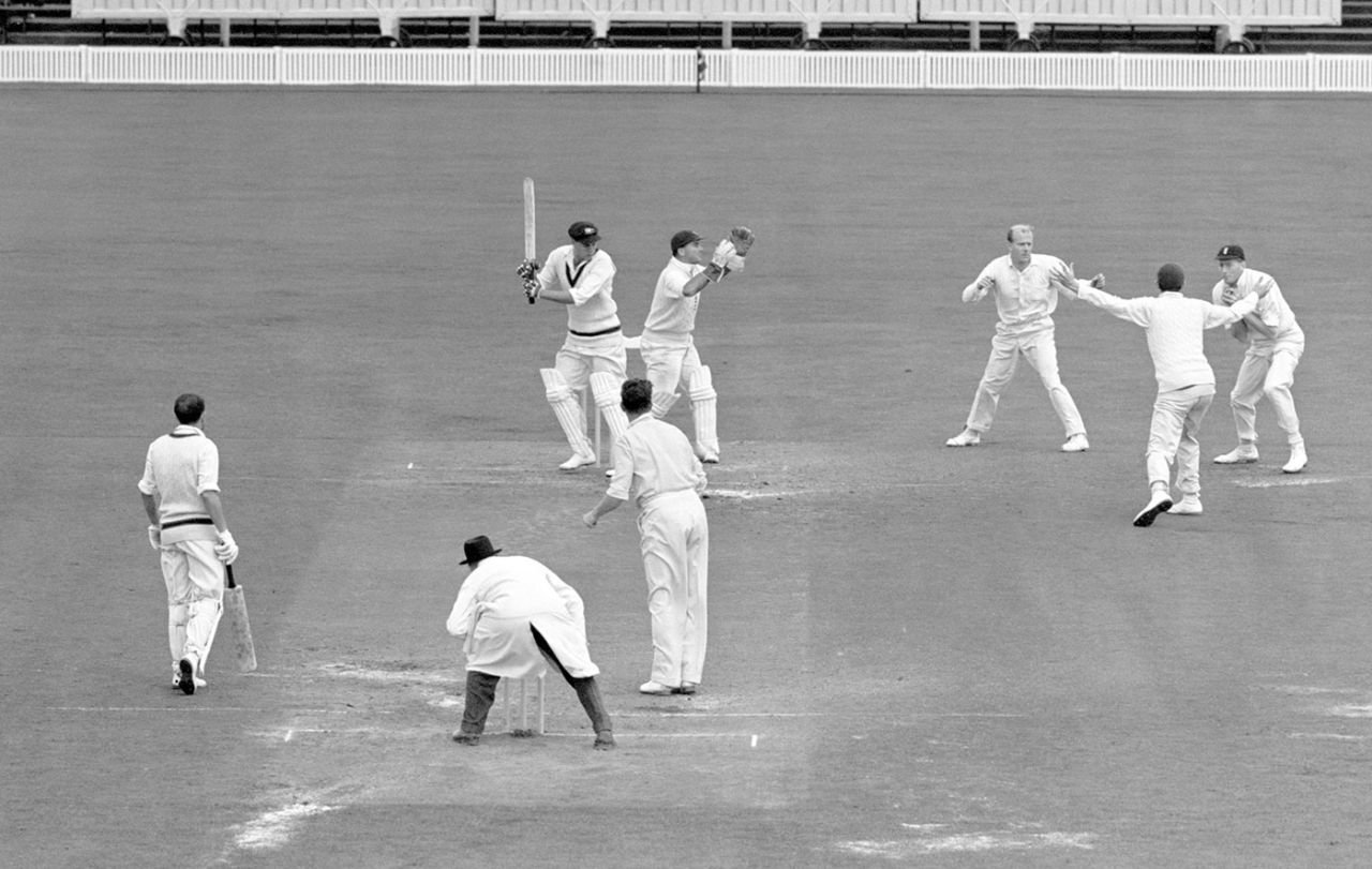 Alan Oakman (right) takes a catch off Jim Laker, England v Australia, 4th Test, Old Trafford, July 31, 1956