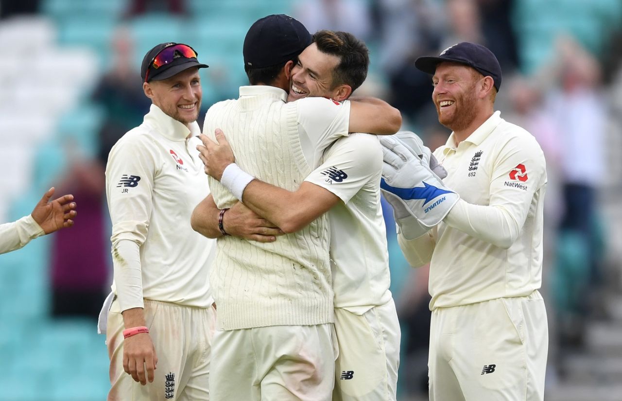 James Anderson is congratulated by his teammates for surpassing Glenn McGrath's tally of 563 Test wickets, England v India, 5th Test, The Oval, 5th day, September 11, 2018