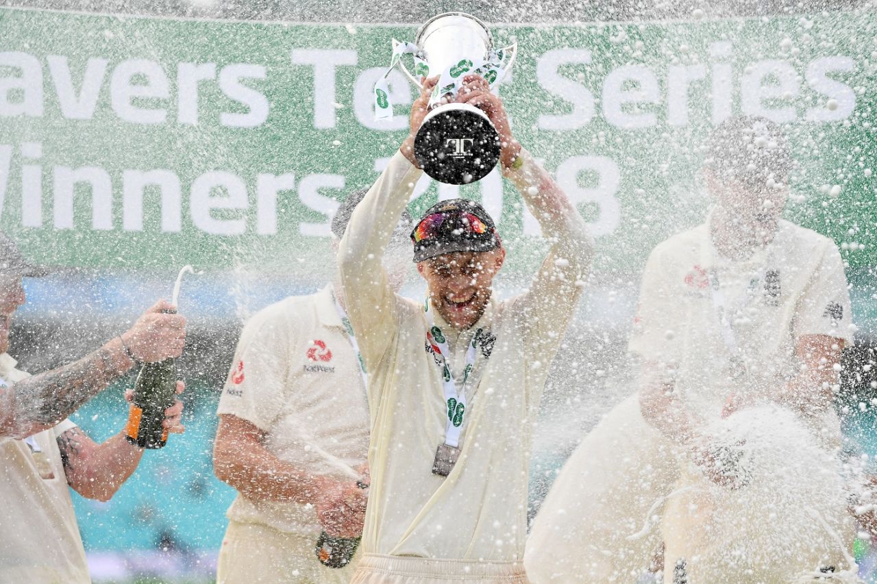 England uncork the champagne as Joe Root holds aloft the winner's trophy, England v India, 5th Test, The Oval, 5th day, September 11, 2018