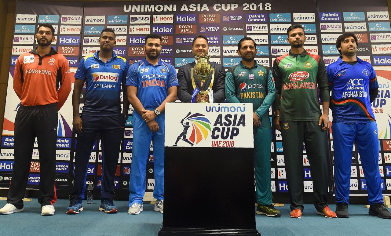 Anshy Rath, Angelo Mathews, Rohit Sharma, Sarfraz Ahmed, Mashrafe Mortaza and Asghar Afghan with the Asia Cup trophy, Dubai, September 14, 2018