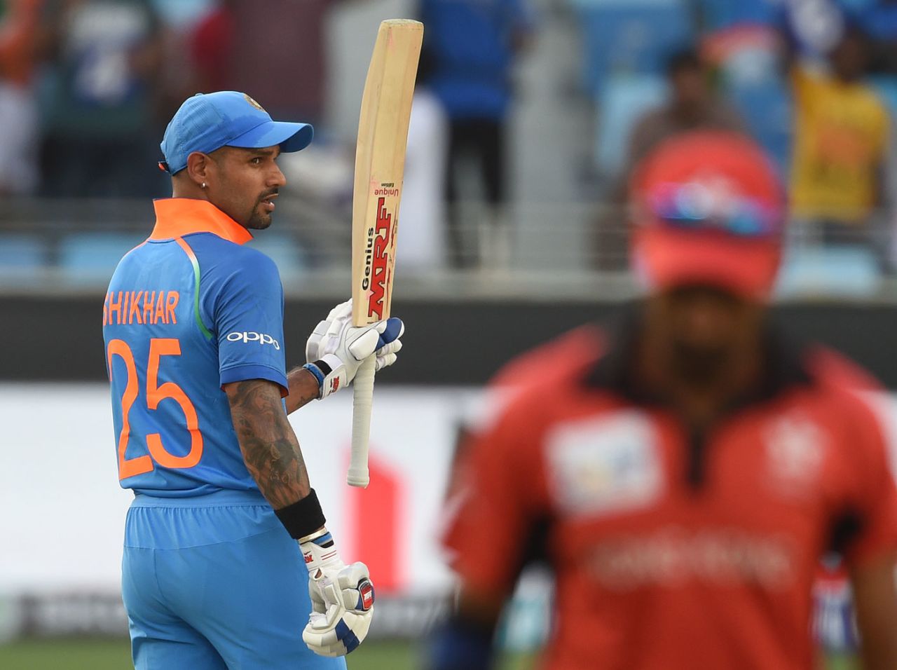 Shikhar Dhawan raises his bat to acknowledge a half-century, India v Hong Kong, Asia Cup 2018, Dubai, September 18, 2018