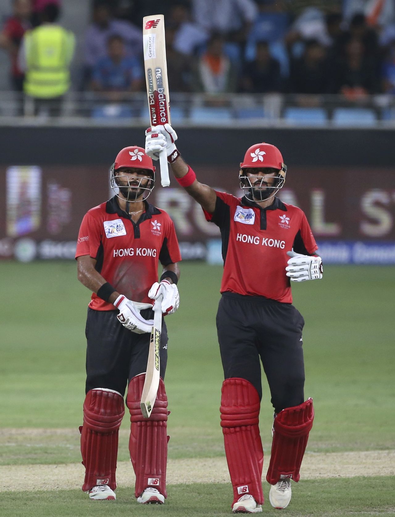 Anshy Rath looks on as Nizakat Khan raises the bat for his fifty, India v Hong Kong, Asia Cup 2018, Dubai, September 18, 2018