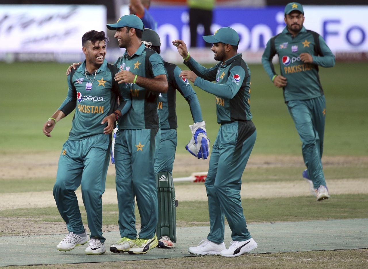 Shadab Khan and his team-mates celebrate Rohit Sharma's dismissal, India v Pakistan, Asia Cup 2018, Dubai, September 19, 2018